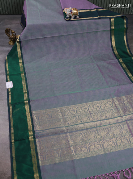 Kanchipuram silk cotton saree dual shade of greenish lavender and dual shade of dark green with allover zari stripe pattern and rettapet zari woven border