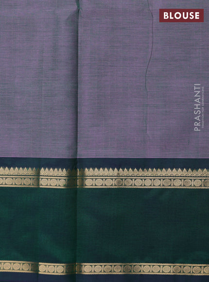 Kanchipuram silk cotton saree dual shade of greenish lavender and dual shade of dark green with allover zari stripe pattern and rettapet zari woven border