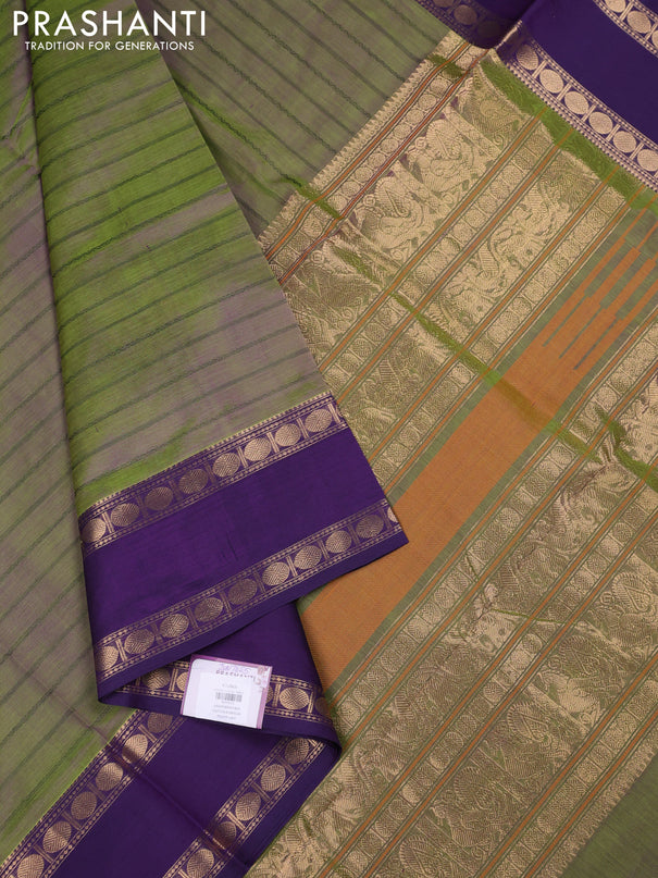 Kanchipuram silk cotton saree dual shade of green and violet with allover thread weaves and rettapet zari woven border
