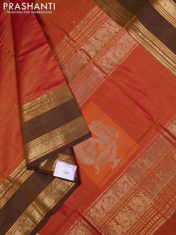 Kanchipuram silk cotton saree sunset orange and brown shade with zari woven buttas and zari woven border