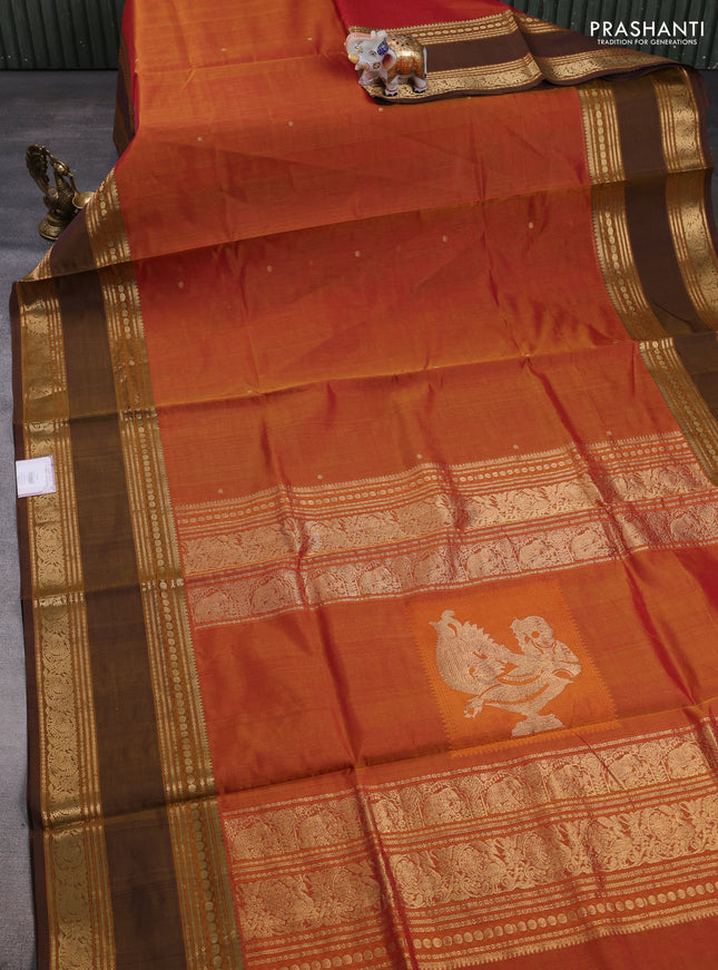 Kanchipuram silk cotton saree sunset orange and brown shade with zari woven buttas and zari woven border