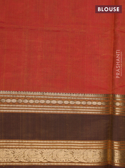 Kanchipuram silk cotton saree sunset orange and brown shade with zari woven buttas and zari woven border