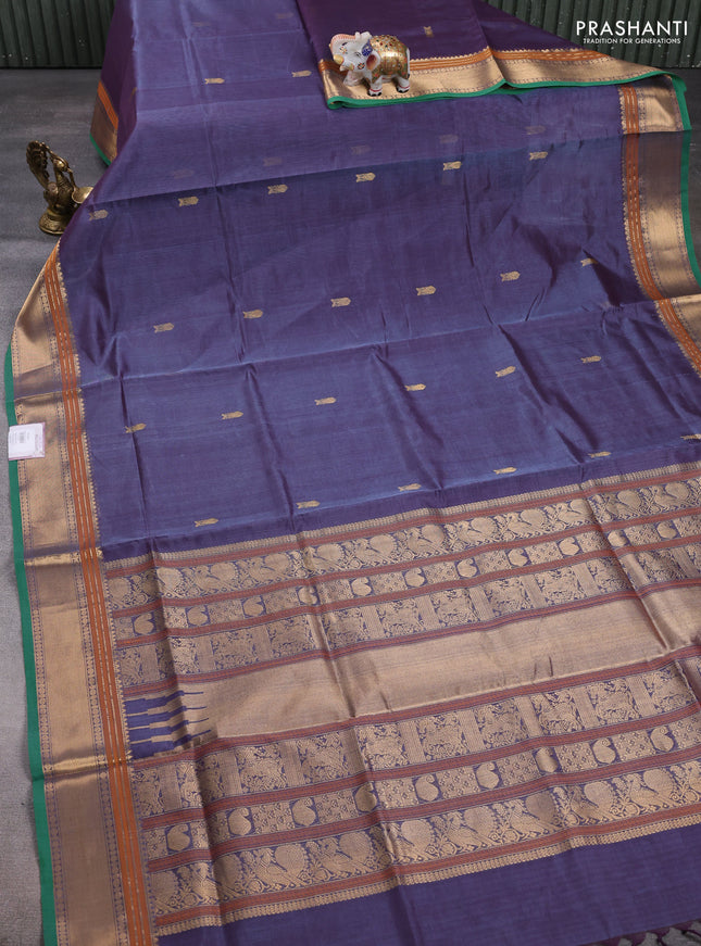 Kanchipuram silk cotton saree dual shade of violet and green with zari woven buttas and zari woven border