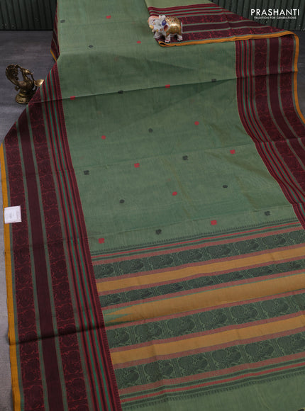 Kanchipuram silk cotton saree green shade and maroon mustard with annam & rudhraksha thread woven buttas and long thread woven border