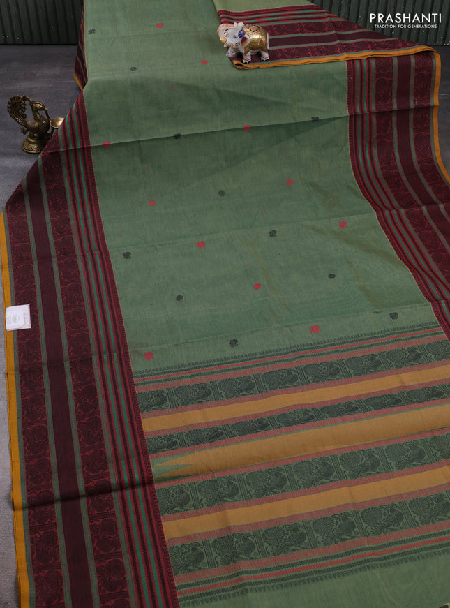 Kanchipuram silk cotton saree green shade and maroon mustard with annam & rudhraksha thread woven buttas and long thread woven border