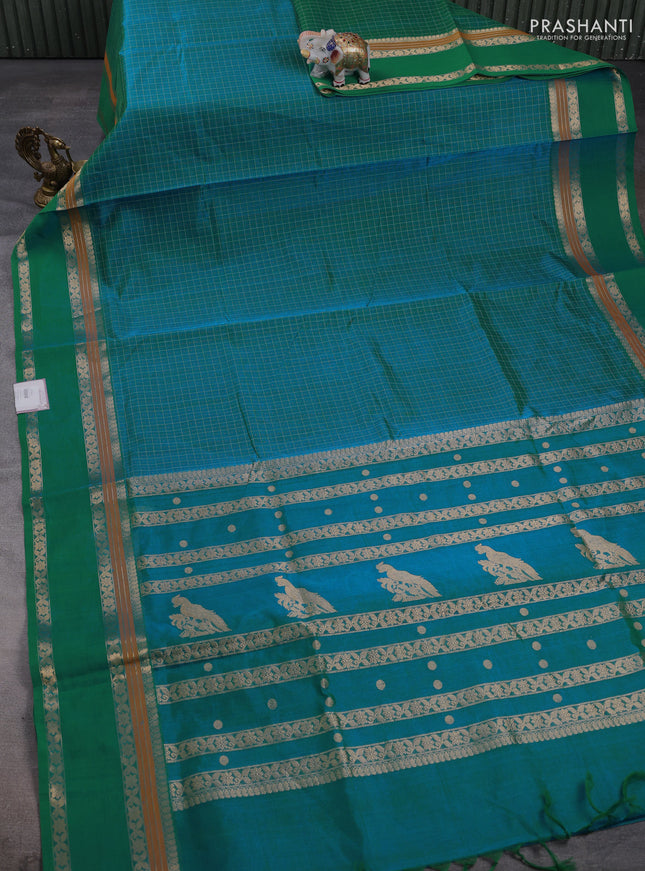 Kanchipuram silk cotton saree dual shade of teal bluish green with allover lakshadeepam weaves and rettapet zari woven border