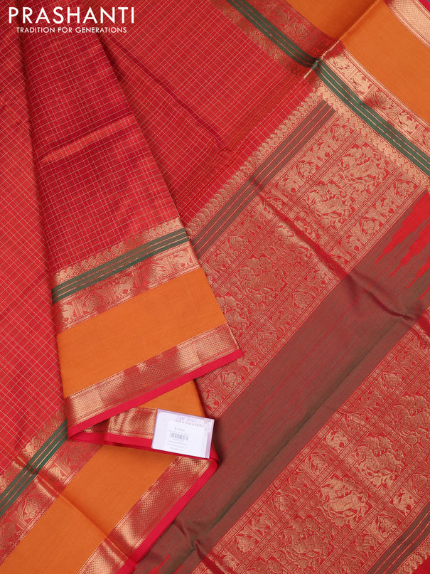 Kanchipuram silk cotton saree orange and mustard yellow with allover lakshadeepam weaves and rettapet zari woven border