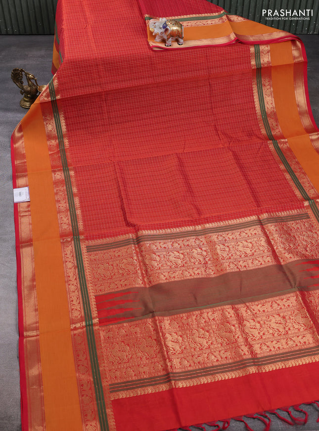 Kanchipuram silk cotton saree orange and mustard yellow with allover lakshadeepam weaves and rettapet zari woven border