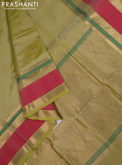 Kanchipuram silk cotton saree pista green and red with zari woven rangoli buttas and rettapet zari woven border