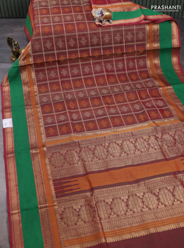 Kanchipuram silk cotton saree dual shade of maroonish green and green with allover thread checks & rangoli buttas and rettapet zari woven border