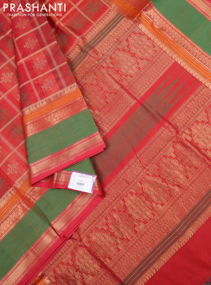 Kanchipuram silk cotton saree sunset orange and green with allover thread checks & rangoli buttas and rettapet zari woven border