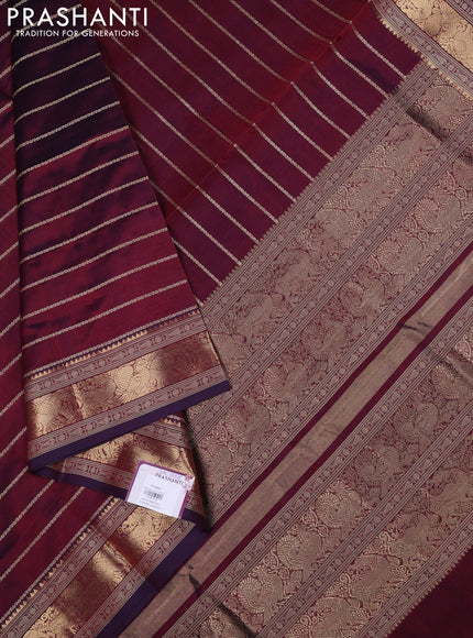 Kanchipuram silk cotton saree dual shade of wine shade with allover thread stripe pattern and zari woven border