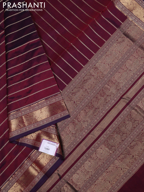 Kanchipuram silk cotton saree dual shade of wine shade with allover thread stripe pattern and zari woven border