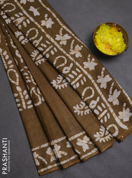 Batik cotton saree mehendi green with allover prints and batik printed border