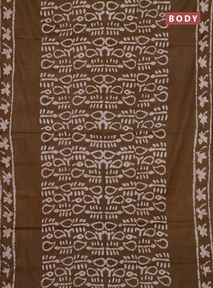 Batik cotton saree mehendi green with allover prints and batik printed border