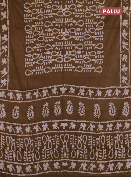 Batik cotton saree mehendi green with allover prints and batik printed border