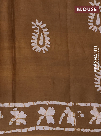 Batik cotton saree mehendi green with allover prints and batik printed border