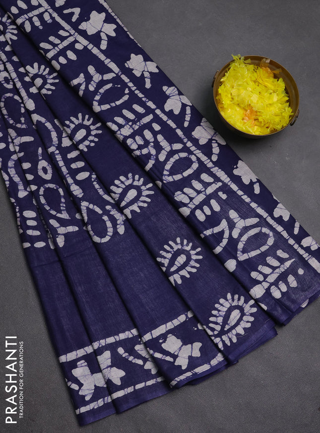Batik cotton saree navy blue with allover prints and batik printed border