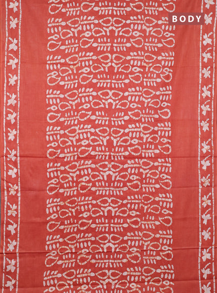 Batik cotton saree rust shade with allover prints and batik printed border