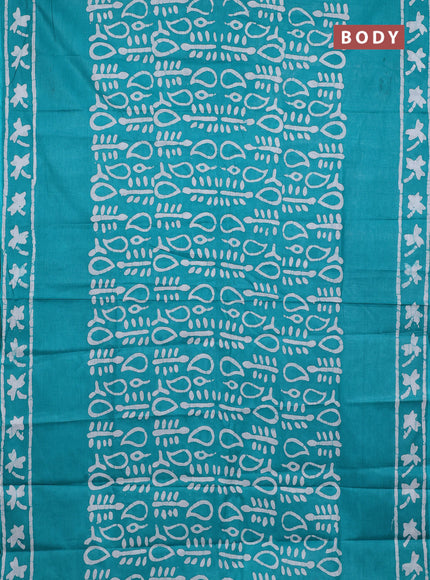 Batik cotton saree teal green with allover prints and batik printed border