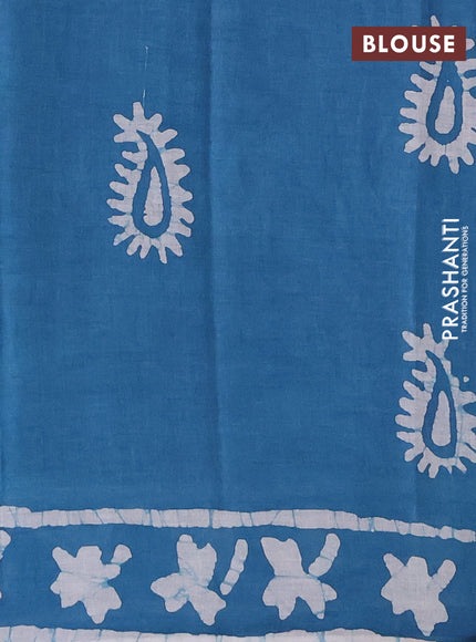 Batik cotton saree peacock blue with allover prints and batik printed border