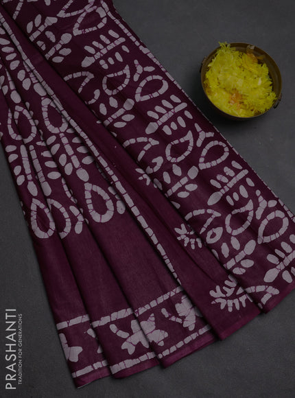 Batik cotton saree deep purple with allover prints and batik printed border