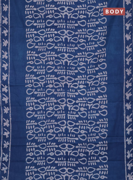 Batik cotton saree peacock blue with allover prints and batik printed border