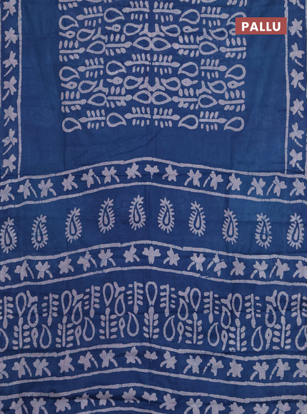 Batik cotton saree peacock blue with allover prints and batik printed border