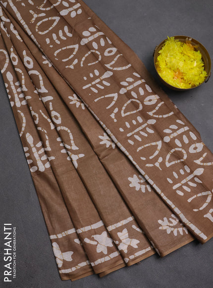 Batik cotton saree dak beige with allover prints and batik printed border