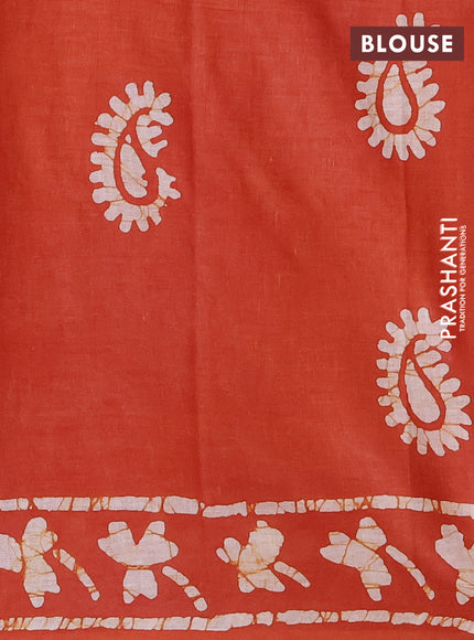Batik cotton saree rustic orange with allover prints and batik printed border