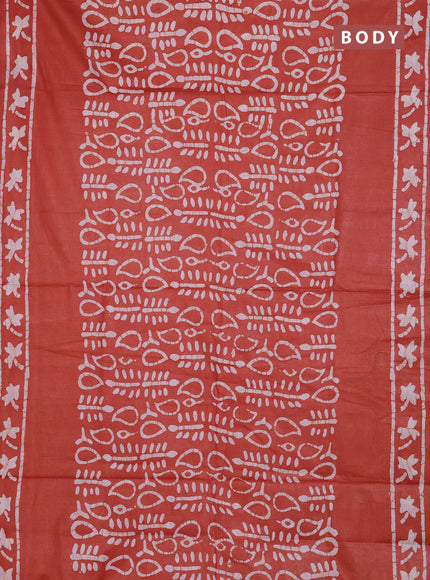 Batik cotton saree rustic orange with allover prints and batik printed border