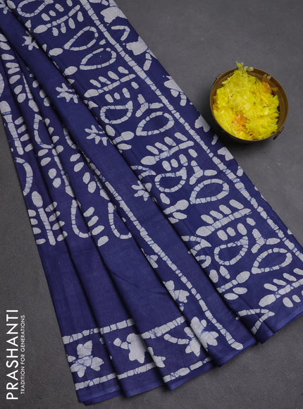 Batik cotton saree blue with allover prints and batik printed border