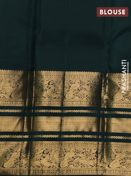 Pure kanchipuram silk saree bottle green with allover zari woven 1000 buttas and long zari woven peacock border