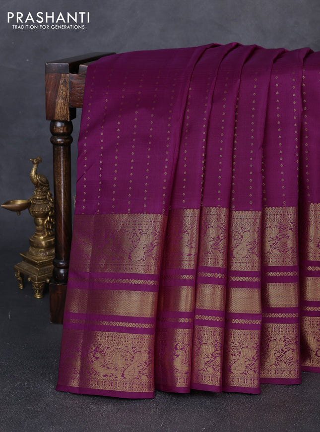 Pure kanchipuram silk saree purple with allover zari woven 1000 buttas and long zari woven peacock border