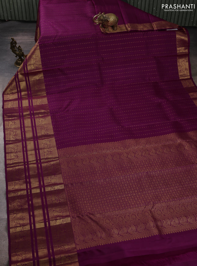 Pure kanchipuram silk saree purple with allover zari woven 1000 buttas and long zari woven peacock border