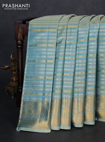 Pure kanchipuram silk saree teal with allover silver & gold zari woven veldhari weaves and rich zari woven border
