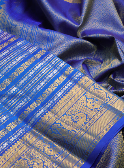 Pure kanchipuram silk saree blue with allover silver & gold zari woven veldhari weaves and rich zari woven border