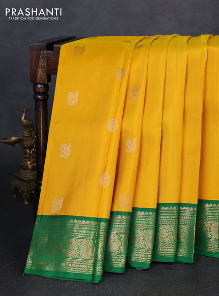 Pure kanchipuram silk saree yellow and green with annam & rudhraksha zari woven buttas and rich zari woven peacock border
