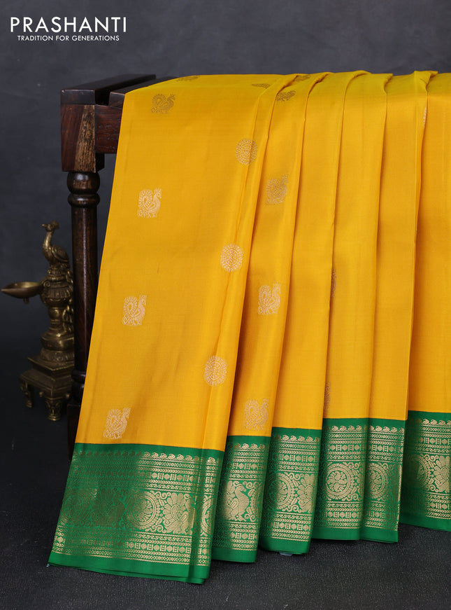Pure kanchipuram silk saree yellow and green with annam & rudhraksha zari woven buttas and rich zari woven peacock border