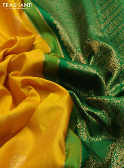 Pure kanchipuram silk saree yellow and green with annam & rudhraksha zari woven buttas and rich zari woven peacock border