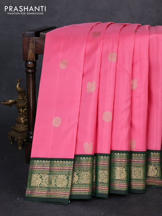 Pure kanchipuram silk saree light pink and bottle green with annam & rudhraksha zari woven buttas and rich zari woven peacock border