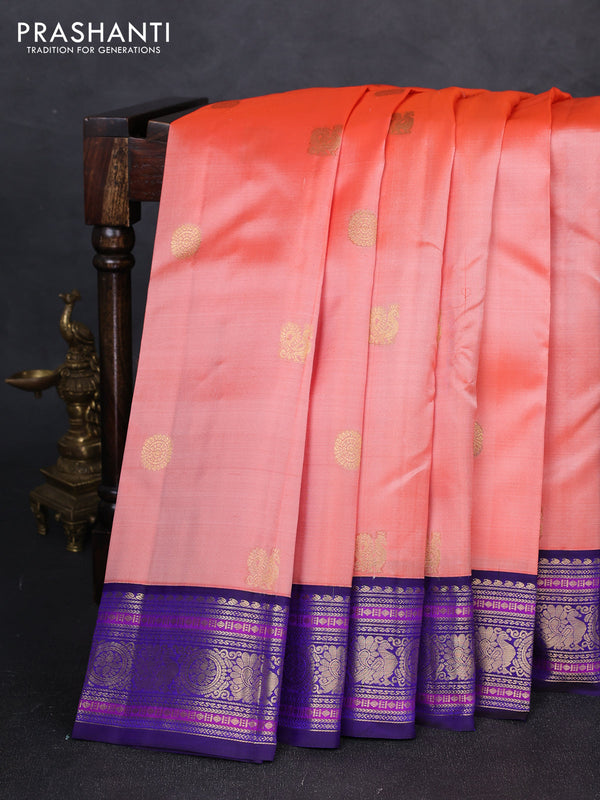 Pure kanchipuram silk saree peach orange and blue with annam & rudhraksha zari woven buttas and rich zari woven peacock border