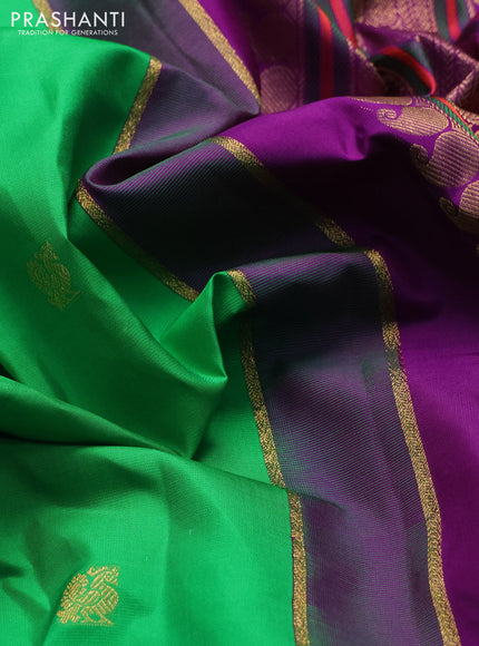 Pure kanchipuram silk saree green and purple with annam & rudhraksha zari woven buttas and long zari woven peacock border