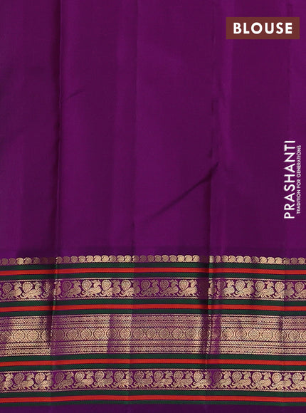 Pure kanchipuram silk saree green and purple with annam & rudhraksha zari woven buttas and long zari woven peacock border