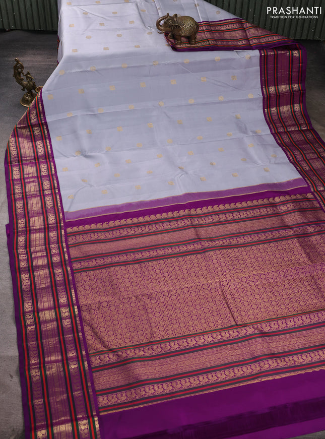 Pure kanchipuram silk saree grey shade and purple with annam & rudhraksha zari woven buttas and long zari woven peacock border