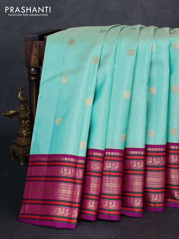 Pure kanchipuram silk saree pastel grey and purple with annam & rudhraksha zari woven buttas and long zari woven peacock border