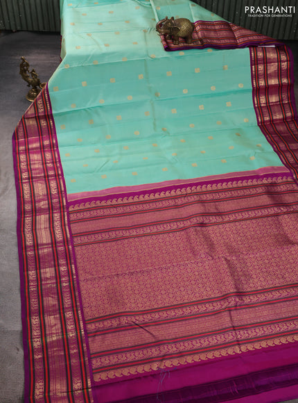 Pure kanchipuram silk saree pastel grey and purple with annam & rudhraksha zari woven buttas and long zari woven peacock border