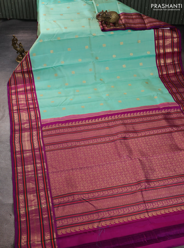 Pure kanchipuram silk saree pastel grey and purple with annam & rudhraksha zari woven buttas and long zari woven peacock border