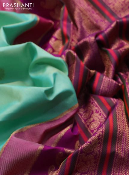Pure kanchipuram silk saree pastel grey and purple with annam & rudhraksha zari woven buttas and long zari woven peacock border
