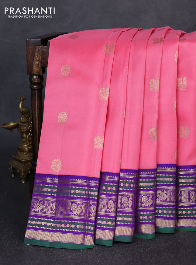 Pure kanchipuram silk saree light pink and violet with annam & rudhraksha zari woven buttas and zari woven peacock design border